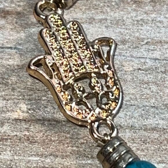 Light Blue Bead Stretch Bracelet with Gold Tone Hamza Hand - Picture 2 of 7